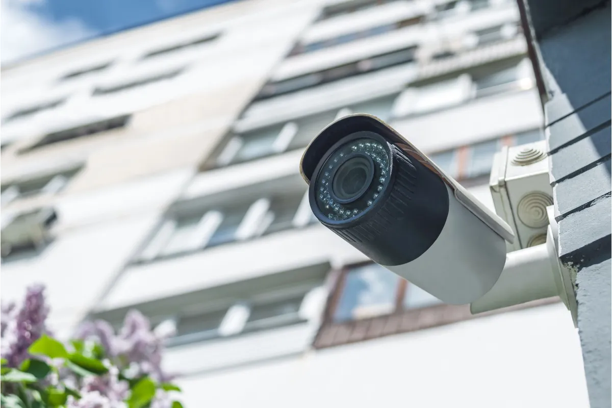 Surveillance camera, against the backdrop of a white house