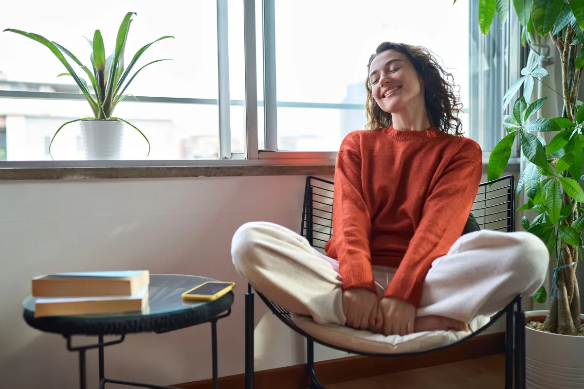 women is happy sitting down the chair