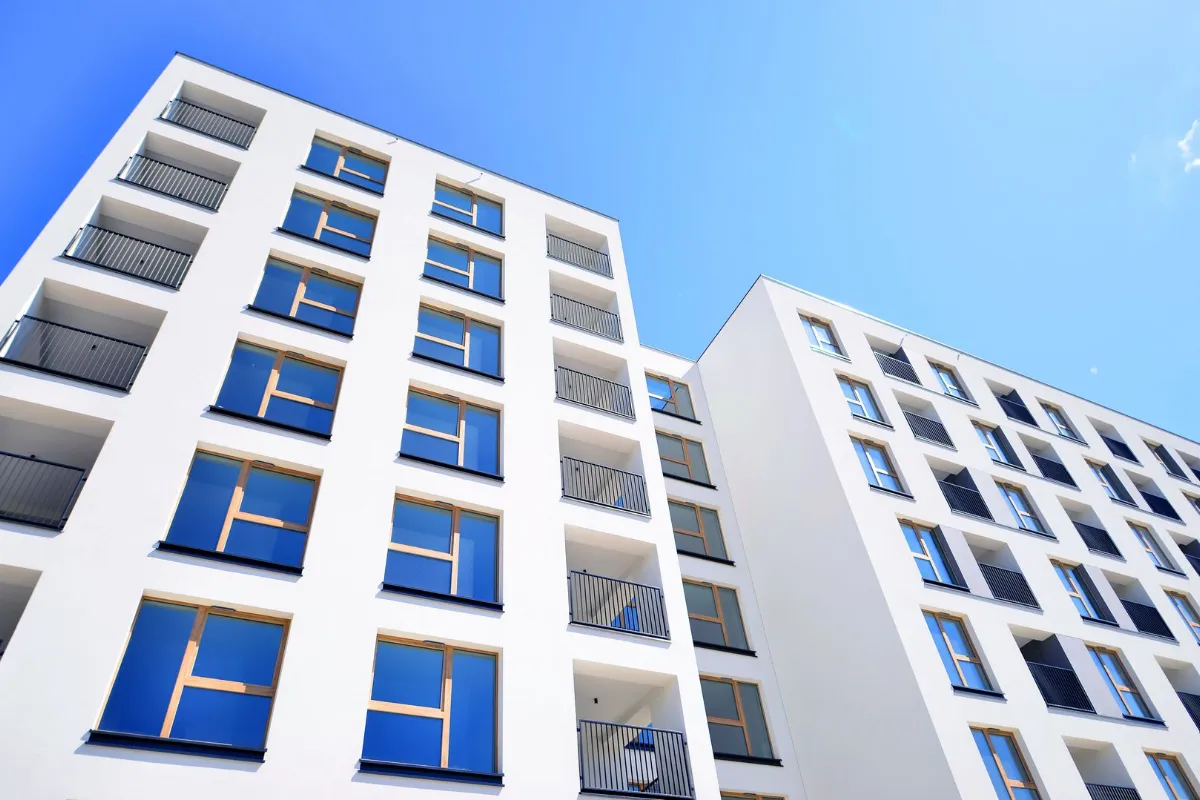 Modern new residential apartment house building complex. Exterior view of modern apartment building.
