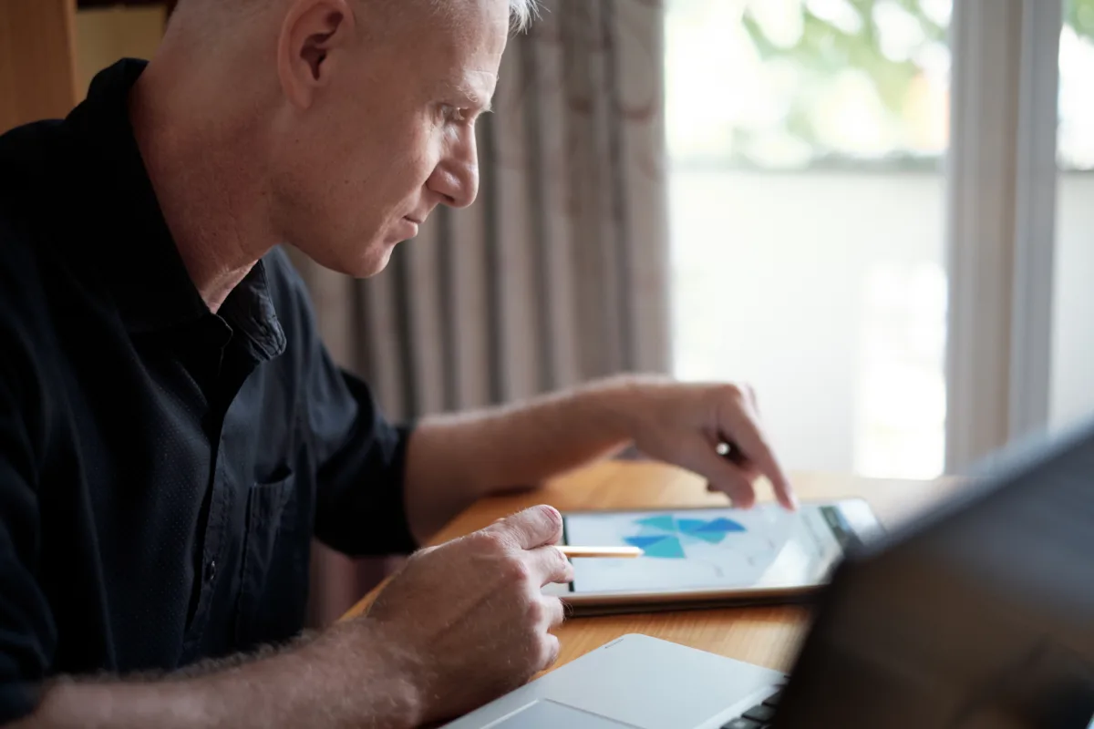 Strata committee member completing online training at home.